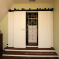 Four sliding barn doors with customized hardware for closet